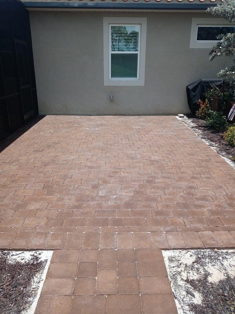 Before: Faded pavers, cleaned & sealed