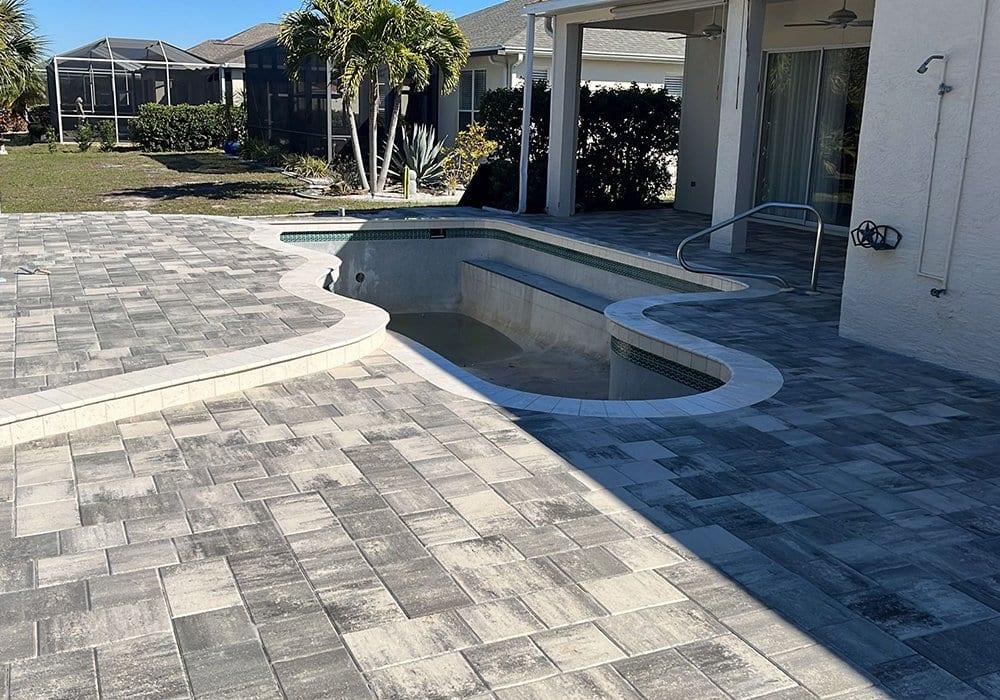 Pool Deck & Driveway Renovation — Paver Mac project photo 6